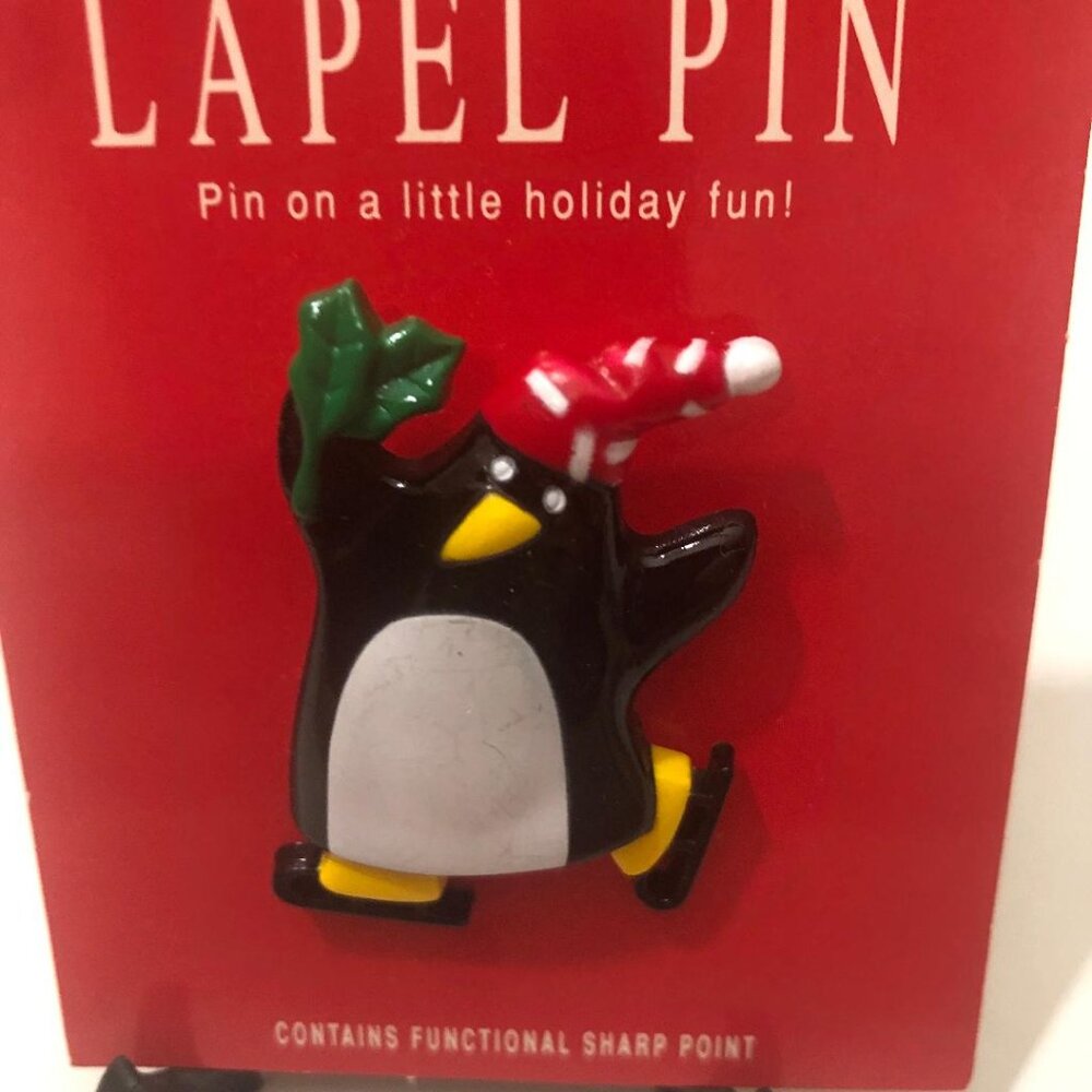 New Vintage Hallmark Holiday Lapel Pin Skating Penguin Santa Hat Brooch
